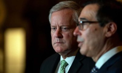 Treasury Secretary Steven Mnuchin speaks to reporters as White House chief of staff Mark Meadows